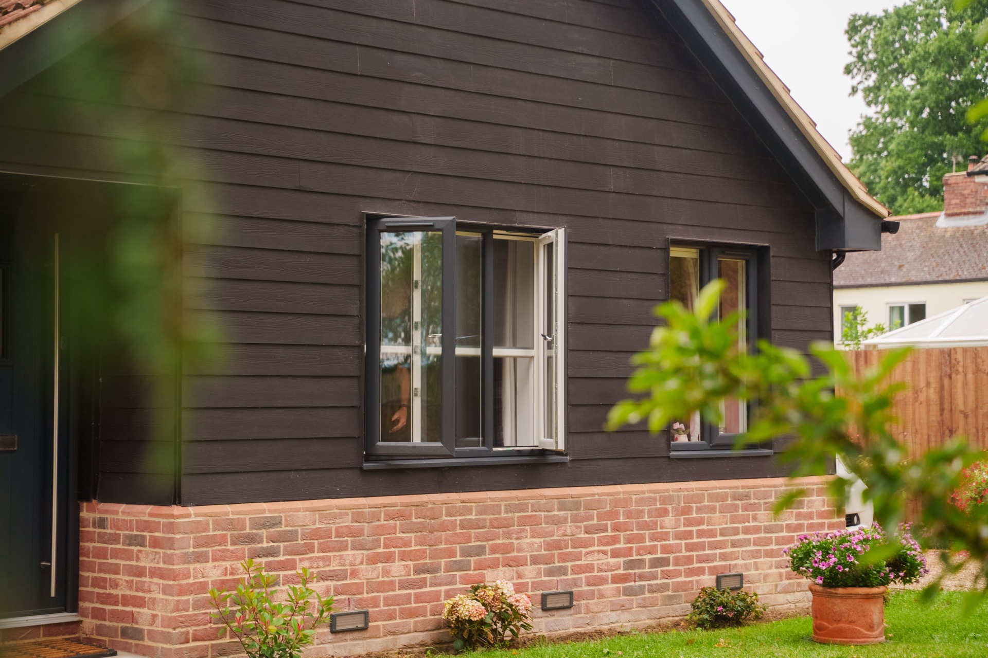 Bi-fold screens installation in Leatherhead